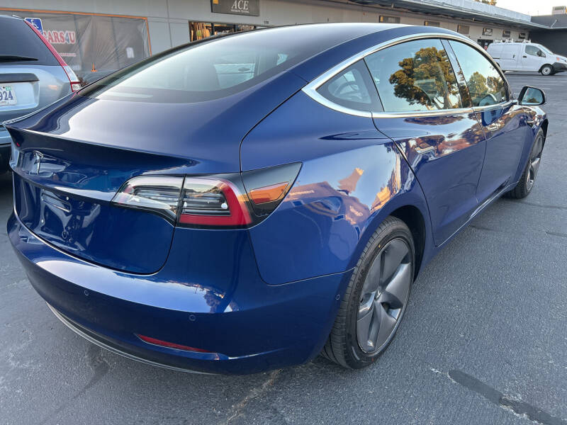 tesla model 3 2018 5YJ3E1EA5JF076774 image tesla model 3 2018 5YJ3E1EA5JF076774 image